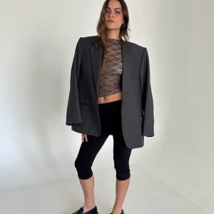 calza capri, calza negra, capri mujer, pantalón capri, calza ajustada